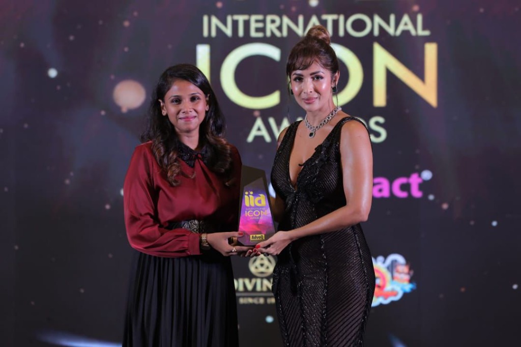 Malaika Arora presenting award trophy closeup